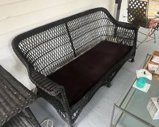$150 Vintage black rattan sofa; 72" L