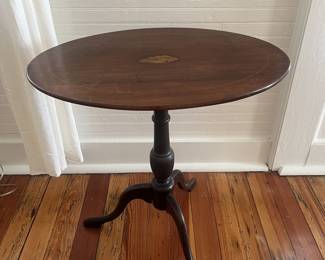 $75 Antique tilt-top tea table; approx. 25" x 26" x 16"