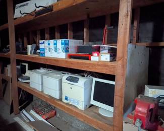 Lots of printers, monitors, book binding unit, paper goods, misc office supplies