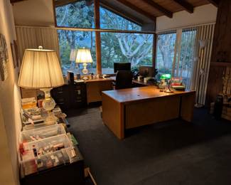 Home Office space! The view is amazing! lots of office supplies, paper and misc office equipment.