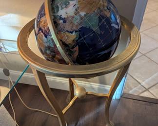 Intersting globe on brass stand