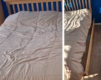 Queen bed frame with trundle drawer for an extra bed