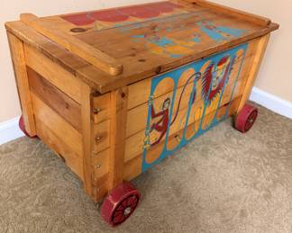 Vintage painted toy chest on wheels