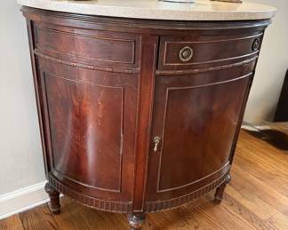 Demilune cabinet