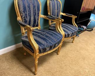 Gilded French armchairs