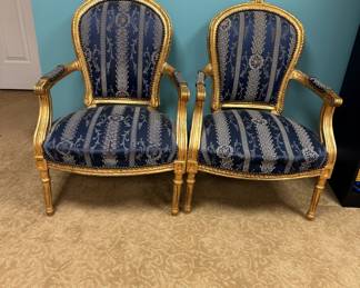 Gilded French armchairs