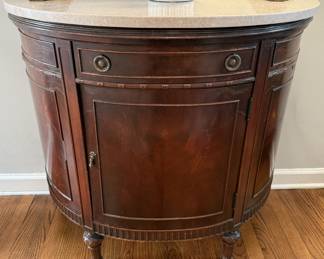 Demilune cabinet