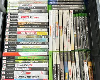 A selection of Xbox, PlayStation, and Wii Games