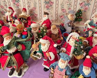 A variety of Clothtique Santas, most come with boxes!