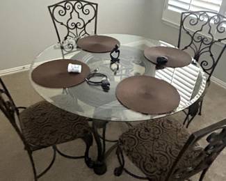 What iron glass top dining room table?