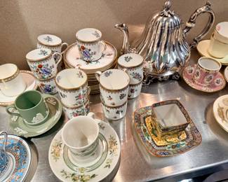 Collection of teacups and demitasse cups