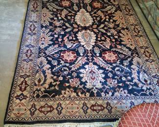 A nice rug actually. Hand made in India. 6' x 9'. $125