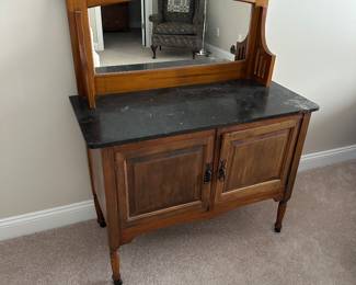 Art Nouveau carved oak mirrored cabinet
