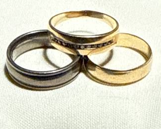 2 gold and 1 Titanium ring