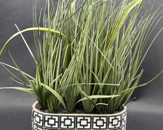 Artificial plant in decorative container