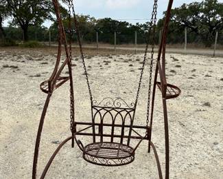 Wrought iron swing.  43" front to back / 58" wide / 87.5" high