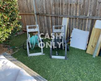 Two long hoses with rollers.