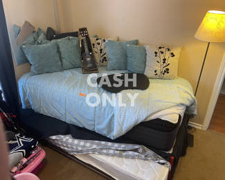 Daybed with plush top mattress and trundle.