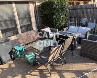 Electric smoker and patio furniture.