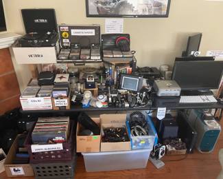 Lots of eclectic vinyl, cassettes, CDs, and DVDs. G3 Blue Mac with working Adobe software, monitors, media projector,  Xbox One with Kinect...