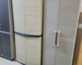 GARAGE CABINETS - four door light gray cabinet with dark gray horizontal handles $75, double door gray cabinet with vertical handles $60