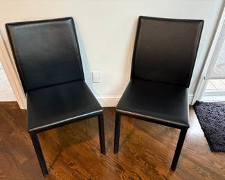 there are 4 of these leather chairs