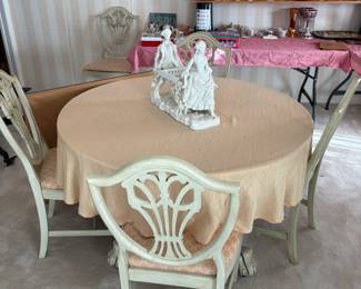round dining table with chairs