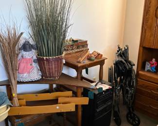 MCM corner table, other small side table, fake plant, wheel chair