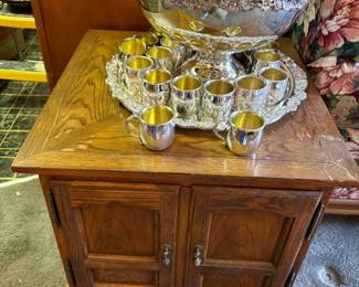 Silverplate punch bowl, cups, underplate, side table