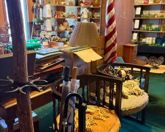 western hall tree, umbrellas, chairs, flag
