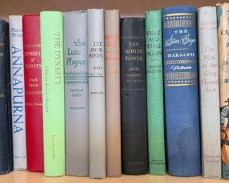 Coffee Table: art, travel, atlases
Cookbooks: Julia Child, Martha Stewart, crepes, Italian
Novels: Vince Flynn, John Sandford, John Grisham, Tom Clancy, WEB Griffin, David Baldacci, Stephen King, Maeve Binchy, Diana Gabaldon, Tami Hoag
Vintage: Pearl Buck, Virginia Wolfe, AA Milne, Cleveland Armorie
