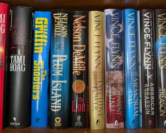 Coffee Table: art, travel, atlases
Cookbooks: Julia Child, Martha Stewart, crepes, Italian
Novels: Vince Flynn, John Sandford, John Grisham, Tom Clancy, WEB Griffin, David Baldacci, Stephen King, Maeve Binchy, Diana Gabaldon, Tami Hoag
Vintage: Pearl Buck, Virginia Wolfe, AA Milne, Cleveland Armorie
