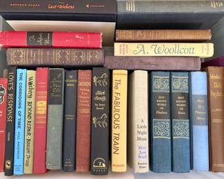 Coffee Table: art, travel, atlases
Cookbooks: Julia Child, Martha Stewart, crepes, Italian
Novels: Vince Flynn, John Sandford, John Grisham, Tom Clancy, WEB Griffin, David Baldacci, Stephen King, Maeve Binchy, Diana Gabaldon, Tami Hoag
Vintage: Pearl Buck, Virginia Wolfe, AA Milne, Cleveland Armorie
