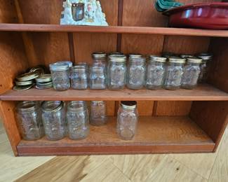 wooden bookcase, mason jars