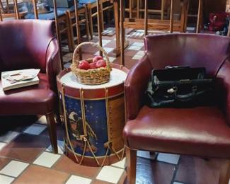 Vintage club chairs, drum side table.