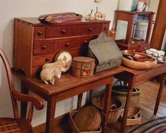 Antique drawers, tables, scale, bin.