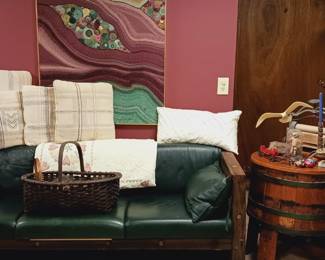 Wood and leather sofa, wringer washer, fiber art.