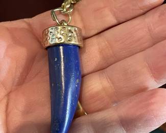  cold blue stone  lapis ?   costume setting    cool retro piece either way  not priced yet 