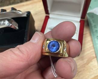 18 k yellow gold custom estate  ring =tanzanite  and diamonds  - see the appraisal for details -  appraisal was for $11000  this past july -  we are selling  for $5900 