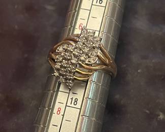 10 K YELLOW GOLD  APPROX SIZE 7.-7.5  DIAMOND RING   -ESTATE PIECE  EXACT CARAT WEIGHT NOT KNOWN  $319   SEE NEXT 2 PICS ALSO 
