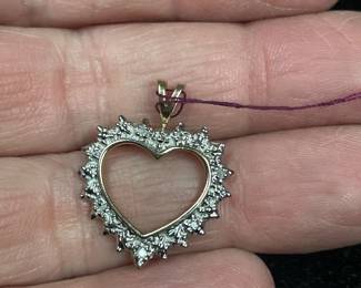 10k yellow gold and tiny dimond heart pendant   $99