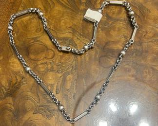 Tasco sterling silver long chain. Very sturdy and solid.