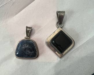 Sterling silver pendants. The first one is so delight from Silpada. The second one is  Taxco silver with black onyx!! 
BEAUTUFUL!!