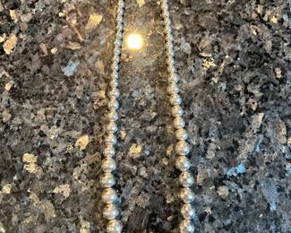 27 in.² silver chain and beads