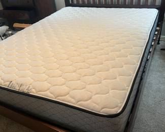 Queen size bed and queen size mattress. Sold separately.