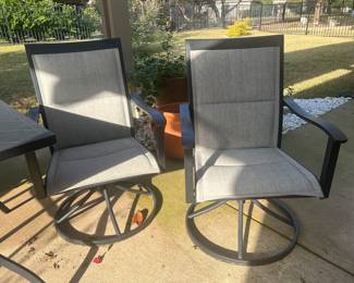 A close-up of two of the four swivel chairs