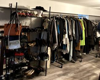 We have a regular boutique! NINE racks of mostly designer clothing, shoes and purses. Several sizes of clothing and shoes are available!