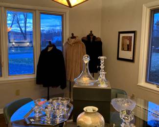 Several pieces of Steuben teardrop pattern: Decanter with bags and box, tall candle holder, short candle holder and 8 tall sherbets/coupes. Beautiful Asain vase, Small pieces of Orrefors and Lalique.