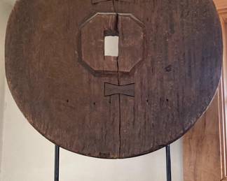 Fabulous antique wheel on a stand