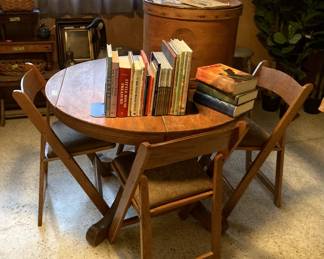 Pedestal table and vintage oak folding chairs